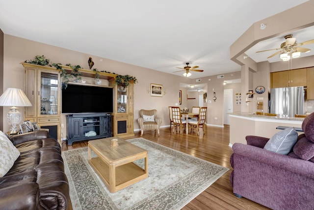 390 S Western Ave Unit 703, Des Plaines, IL 60016 - living room with visible vents, wood finished floors, baseboards, and ceiling fan
