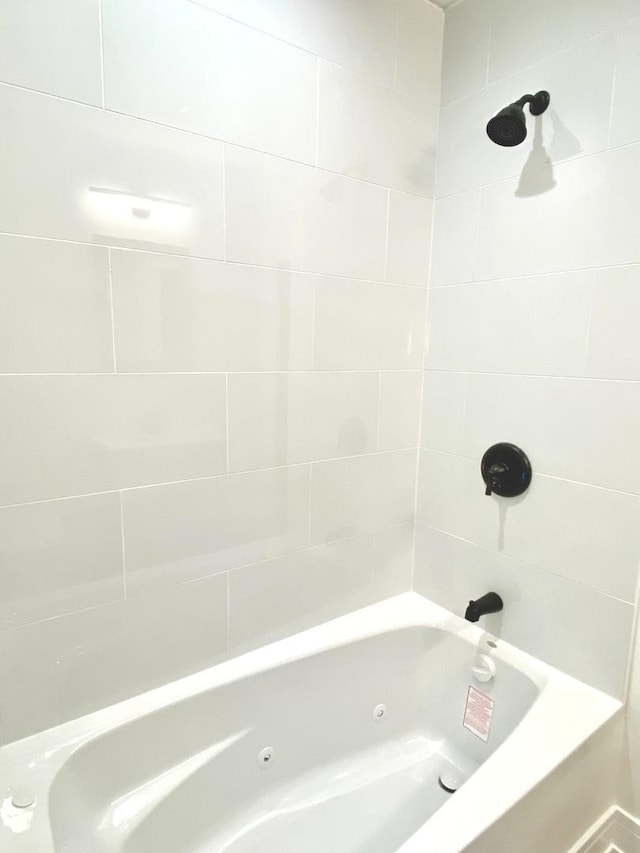 full bath featuring a combined bath / shower with jetted tub