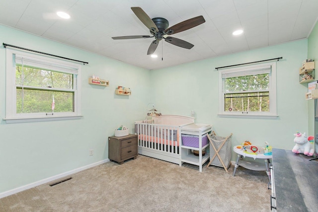 4603 Bonner Dr, Mchenry, IL 60050 - bedroom featuring multiple windows, carpet floors, baseboards, recessed lighting, and ceiling fan