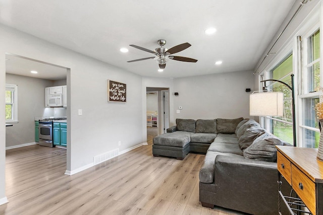 4603 Bonner Dr, Mchenry, IL 60050 - living room featuring ceiling fan, light wood-style flooring, recessed lighting, and baseboards