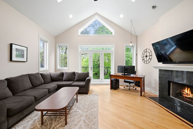 2033 W Rice St Unit 3, Chicago, IL 60622 - living room featuring a high end fireplace, light wood-type flooring, high vaulted ceiling, a desk, and recessed lighting