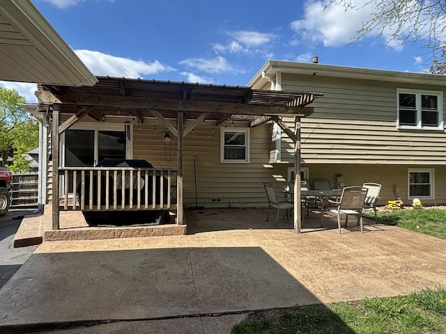 back of house featuring a patio area and a pergola