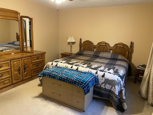 bedroom with light colored carpet