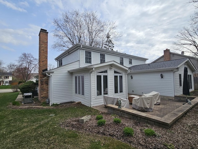 81 W N Ave, Lake Forest, IL 60045 - rear view of property with a lawn and a chimney