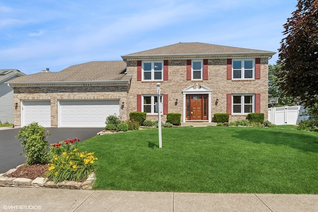 2020 Saint Andrews Dr, Plainfield, IL 60586 - view of front of property with an attached garage, driveway, roof with shingles, and brick siding
