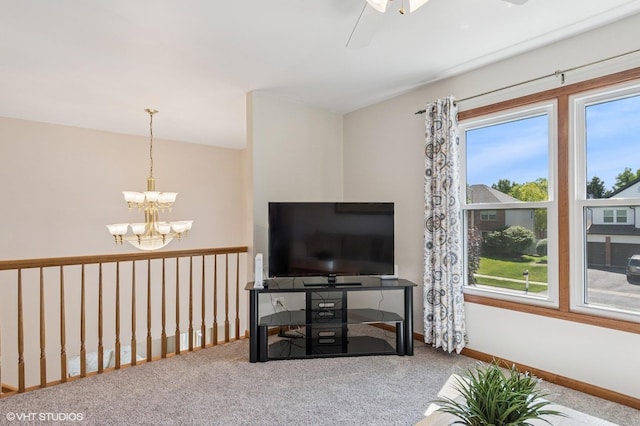 2020 Saint Andrews Dr, Plainfield, IL 60586 - carpeted living room featuring a chandelier and a ceiling fan