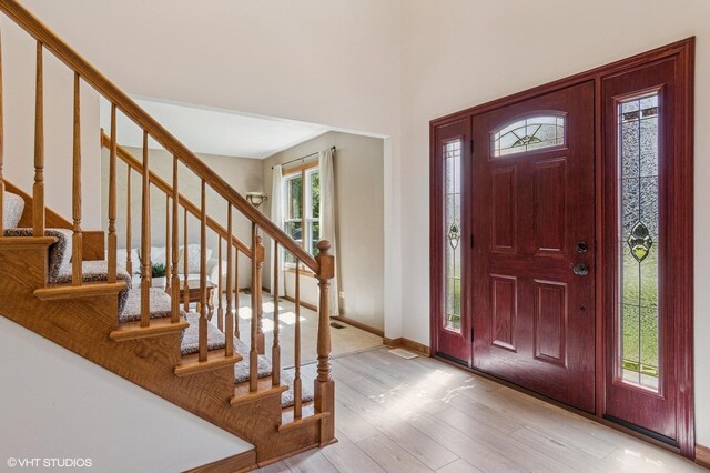 2020 Saint Andrews Dr, Plainfield, IL 60586 - foyer featuring wood finished floors and stairs