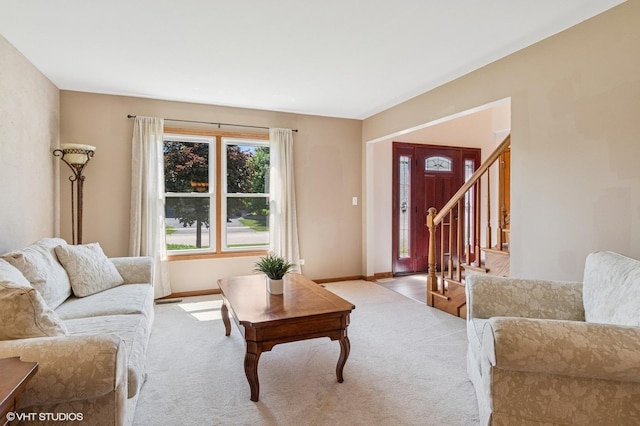 2020 Saint Andrews Dr, Plainfield, IL 60586 - carpeted living room with baseboards and stairway