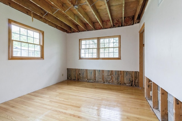 618 Russell Rd, Dekalb, IL 60115 - spare room with plenty of natural light and wood finished floors