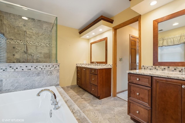 1373 Notre Dame Dr, Lemont, IL 60439 - full bath with a stall shower, two vanities, a garden tub, recessed lighting, and backsplash