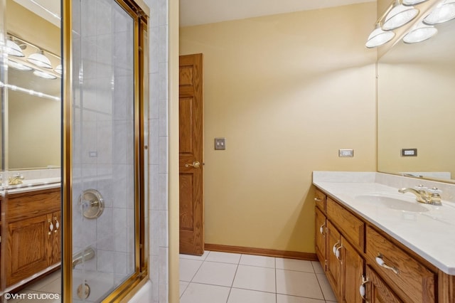 1373 Notre Dame Dr, Lemont, IL 60439 - bathroom featuring tile patterned floors, vanity, shower / bath combination with glass door, and baseboards