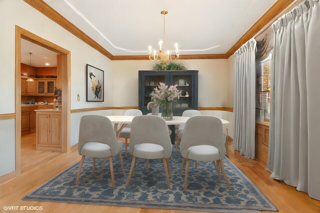 1373 Notre Dame Dr, Lemont, IL 60439 - dining area with a chandelier, light wood finished floors, and wainscoting