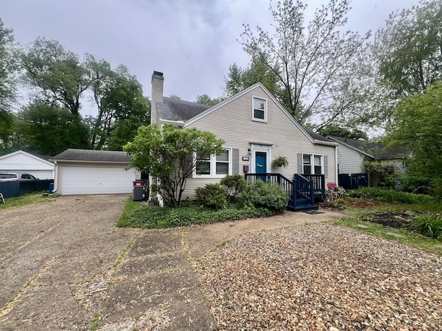 1013 W Springfield Ave, Champaign, IL 61821 - bungalow-style house featuring a chimney and driveway