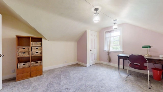 1013 W Springfield Ave, Champaign, IL 61821 - home office with lofted ceiling, carpet flooring, and baseboards