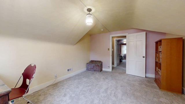 1013 W Springfield Ave, Champaign, IL 61821 - bonus room with lofted ceiling, carpet, and baseboards