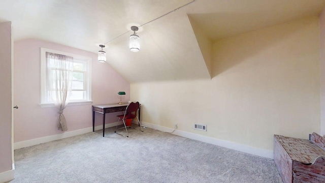 1013 W Springfield Ave, Champaign, IL 61821 - office space featuring lofted ceiling, carpet floors, and baseboards