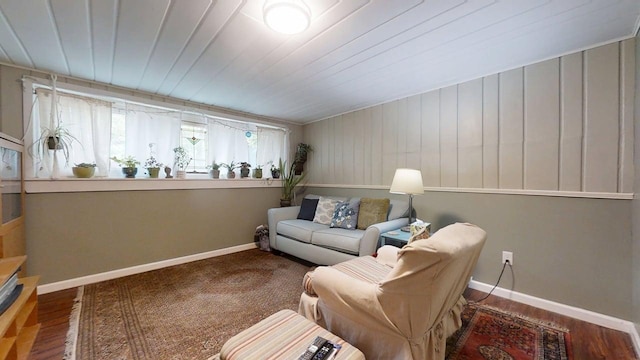 1013 W Springfield Ave, Champaign, IL 61821 - sitting room featuring baseboards and wood finished floors