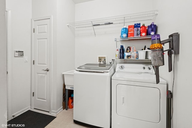 62 Andover Cir, Northbrook, IL 60062 - clothes washing area featuring washing machine and dryer and baseboards