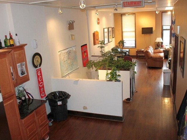 1631 N Halsted St, Chicago, IL 60614 - corridor with track lighting and dark wood-type flooring
