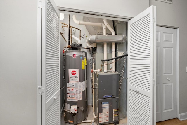 2158 N Natchez Ave Unit 1N, Chicago, IL 60707 - utility room featuring water heater