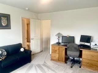 office area with light carpet