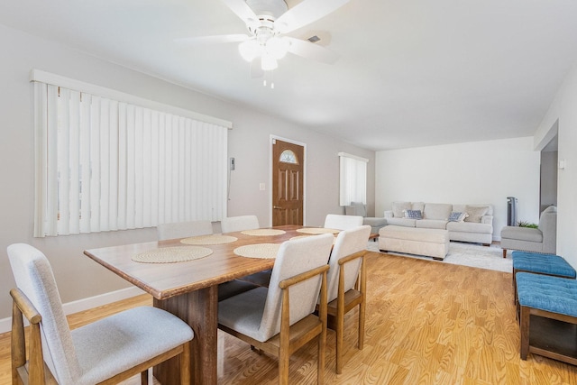 411 E 2nd St, Lockport, IL 60441 - dining room featuring light wood finished floors and ceiling fan