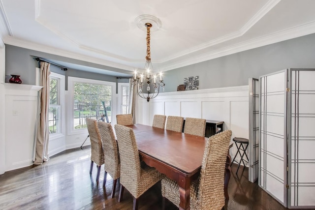 3511 Stackinghay Dr, Naperville, IL 60564 - dining area featuring a chandelier, a raised ceiling, dark wood finished floors, crown molding, and baseboards