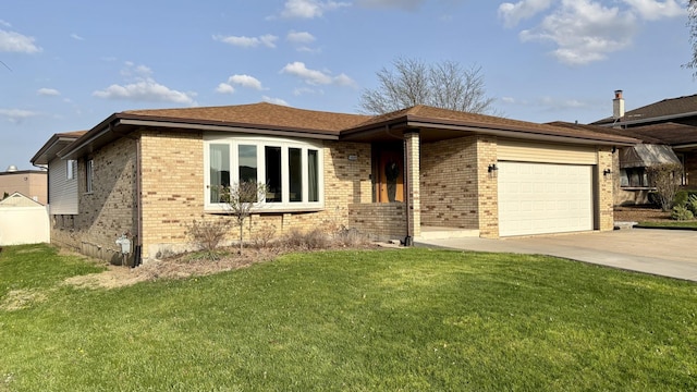 ranch-style home featuring concrete driveway, brick siding, a front yard, and a garage