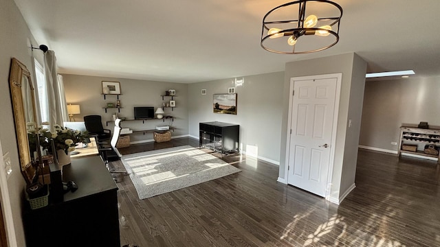 15509 Brianne Ln, Oak Forest, IL 60452 - living area with a desk, wood finished floors, baseboards, and a chandelier