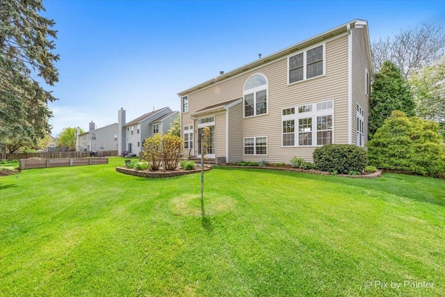 1840 Nashville Ln, Crystal Lake, IL 60014 - rear view of house featuring a yard