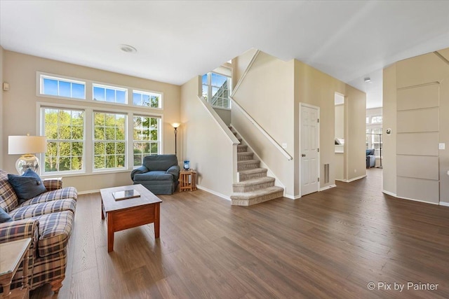 1840 Nashville Ln, Crystal Lake, IL 60014 - living room featuring wood finished floors, baseboards, and stairway