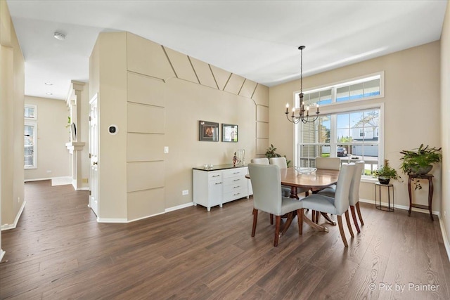 1840 Nashville Ln, Crystal Lake, IL 60014 - dining room featuring a chandelier, dark wood-style flooring, and baseboards