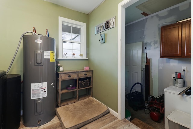 utility room featuring electric water heater