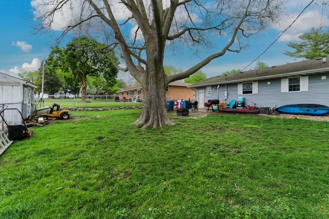 view of yard featuring central air condition unit