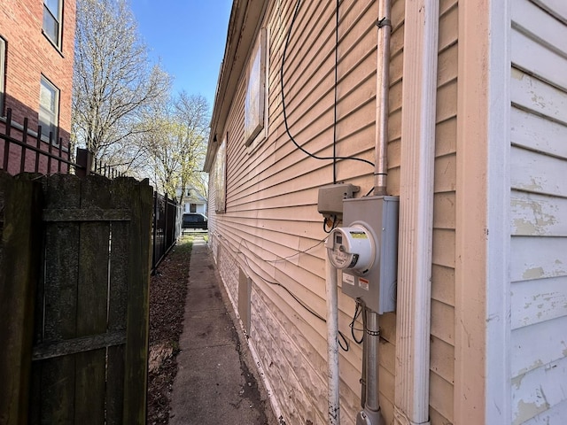 view of property exterior featuring fence