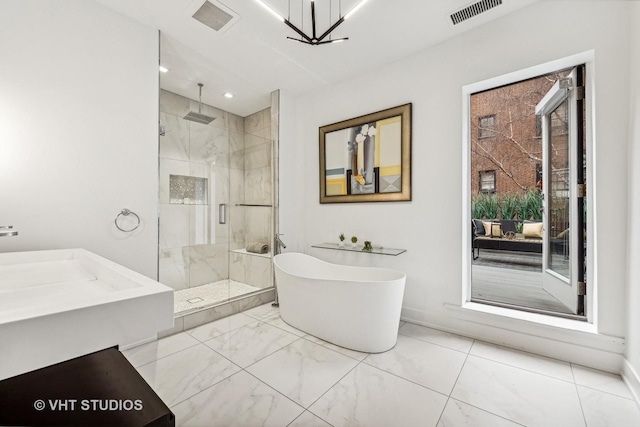 full bath with a stall shower, a soaking tub, marble finish floor, and visible vents