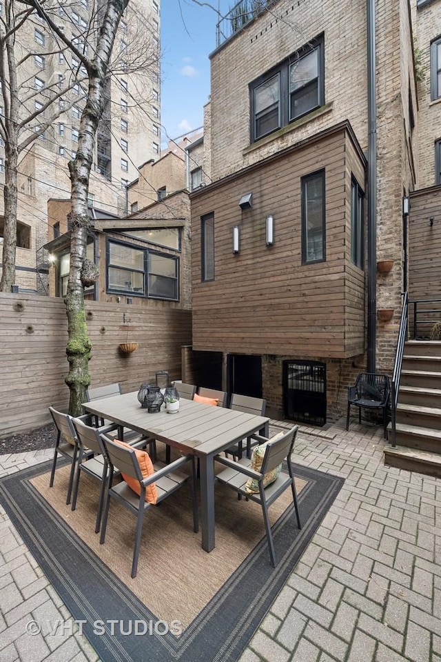 view of patio / terrace with fence and outdoor dining space