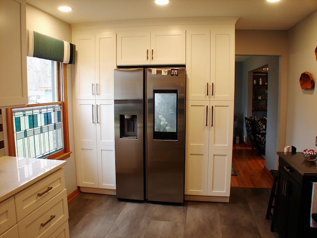 571 Dawn Cir, Grayslake, IL 60030 - kitchen featuring stainless steel fridge, white cabinets, baseboards, light stone countertops, and recessed lighting