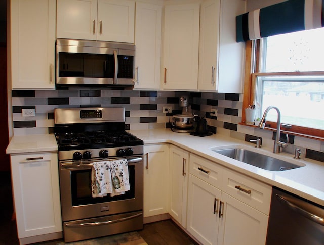 571 Dawn Cir, Grayslake, IL 60030 - kitchen with a sink, stainless steel appliances, and light countertops