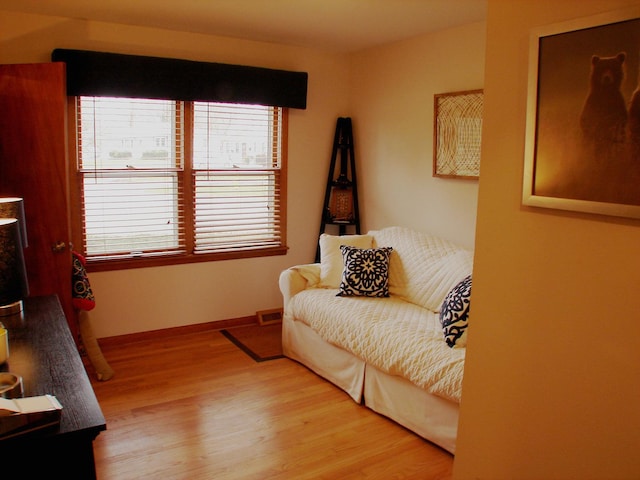 571 Dawn Cir, Grayslake, IL 60030 - living area featuring baseboards and light wood-type flooring