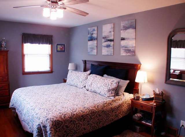 571 Dawn Cir, Grayslake, IL 60030 - bedroom with ceiling fan and wood finished floors