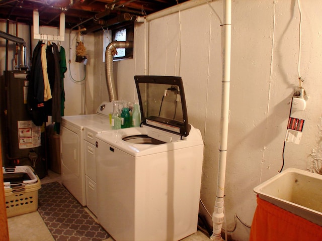 571 Dawn Cir, Grayslake, IL 60030 - laundry room with laundry area, washer and dryer, water heater, and a sink