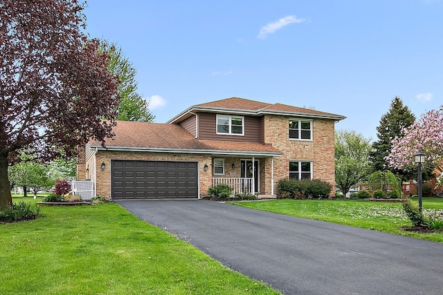 2800 Abbington Dr, New Lenox, IL 60451 - traditional-style house with an attached garage, asphalt driveway, a front yard, brick siding, and a shingled roof