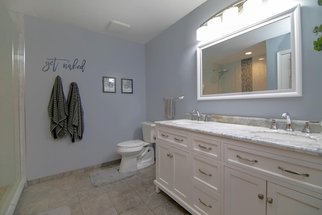 2800 Abbington Dr, New Lenox, IL 60451 - bathroom featuring toilet, a tile shower, baseboards, and double vanity