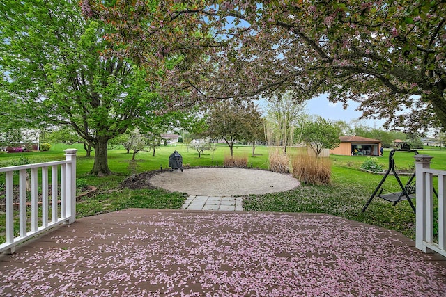 2800 Abbington Dr, New Lenox, IL 60451 - surrounding community featuring a lawn and a patio area