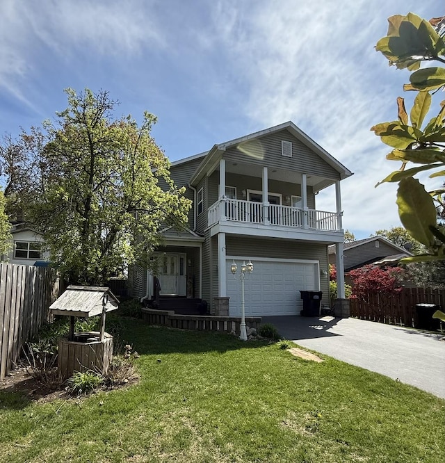 24725 W Hawthorne Dr, Round Lake, IL 60073 - view of front facade featuring driveway, a garage, and a balcony