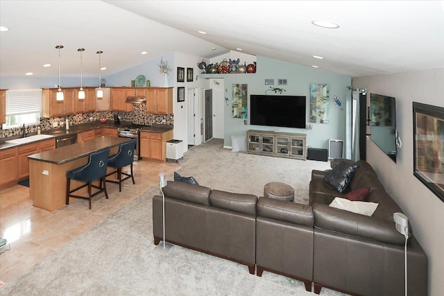 24725 W Hawthorne Dr, Round Lake, IL 60073 - living area with vaulted ceiling, light tile patterned floors, and recessed lighting