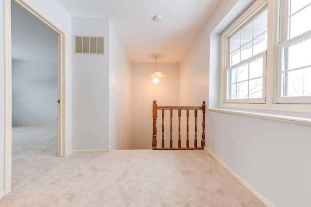26 Prairie Dr, Westmont, IL 60559 - corridor featuring visible vents, baseboards, and carpet floors