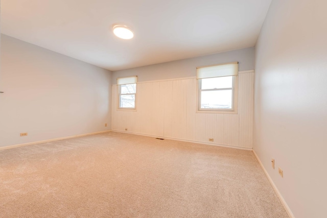 26 Prairie Dr, Westmont, IL 60559 - unfurnished room featuring baseboards and light carpet