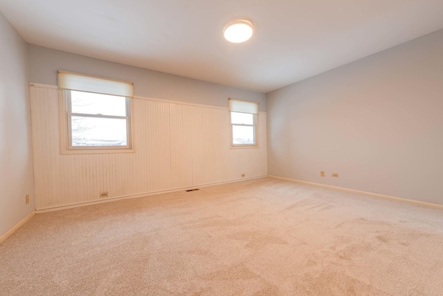 26 Prairie Dr, Westmont, IL 60559 - spare room with baseboards, visible vents, and carpet